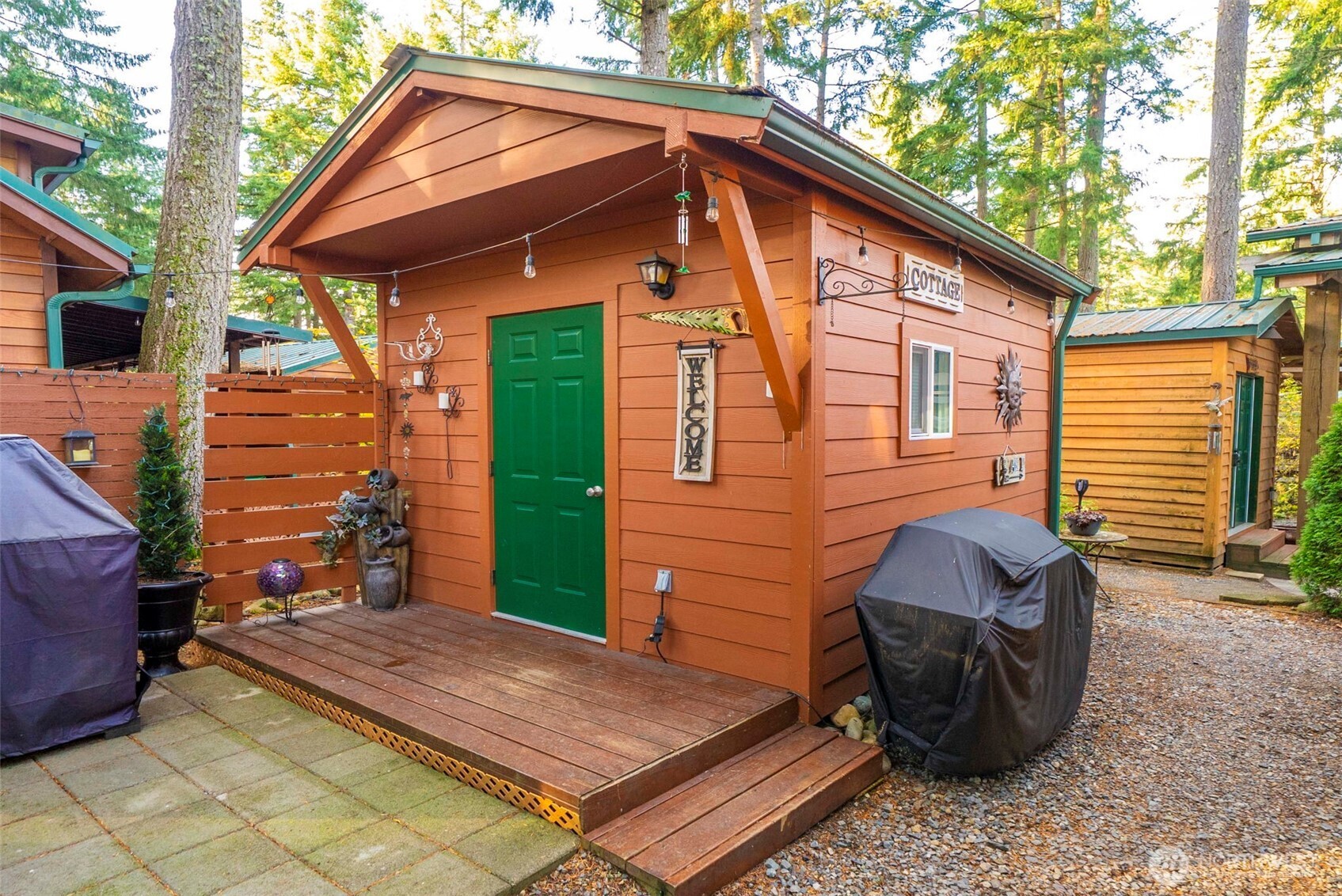 1546 Reservation Road Southeast, Unit 218 Olympia, WA 98513 - Photo 24 of 40 a view of house with backyard and sitting area