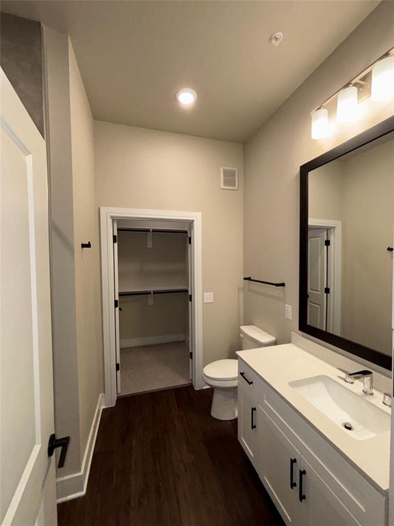111 Town Place, Unit 2610 Fairview, TX 75069 - Photo 10 of 31 a bathroom with a sink and a mirror