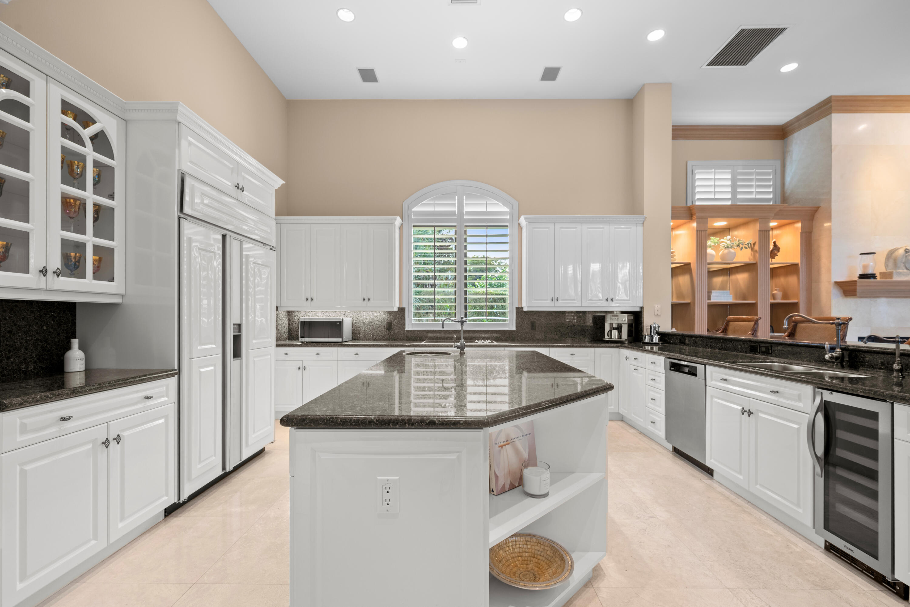 18800 Long Lake Drive Boca Raton, FL 33496 - Photo 16 of 60 a kitchen with stainless steel appliances granite countertop a sink stove and cabinets