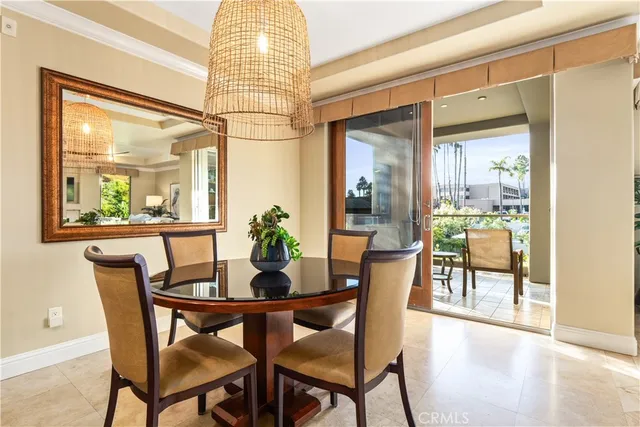 a view of a dining room with furniture and a table