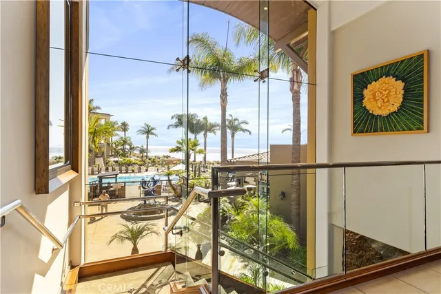 a view of a backyard with a table and chairs