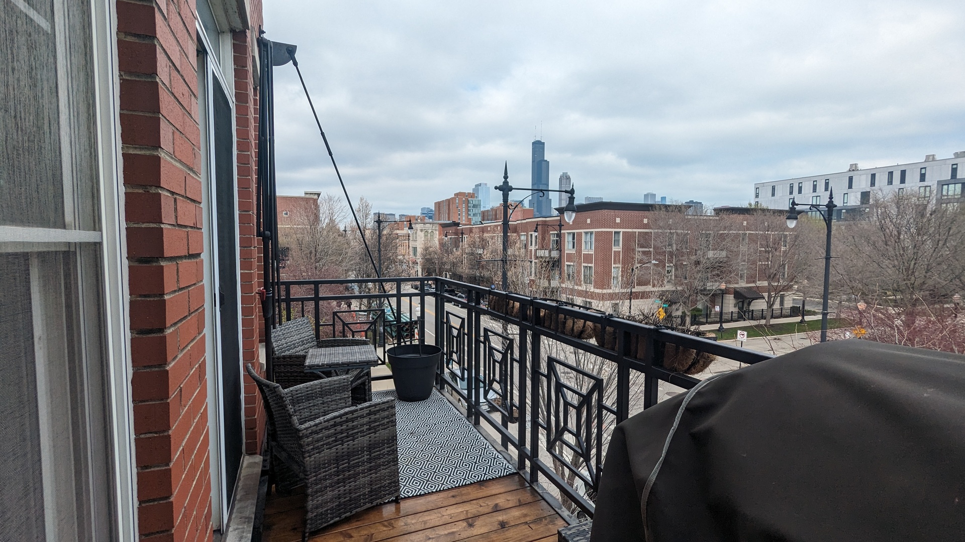 1406 South Halsted Street, Unit 3B Chicago, IL 60607 - Photo 2 of 3 a view of a balcony with city view