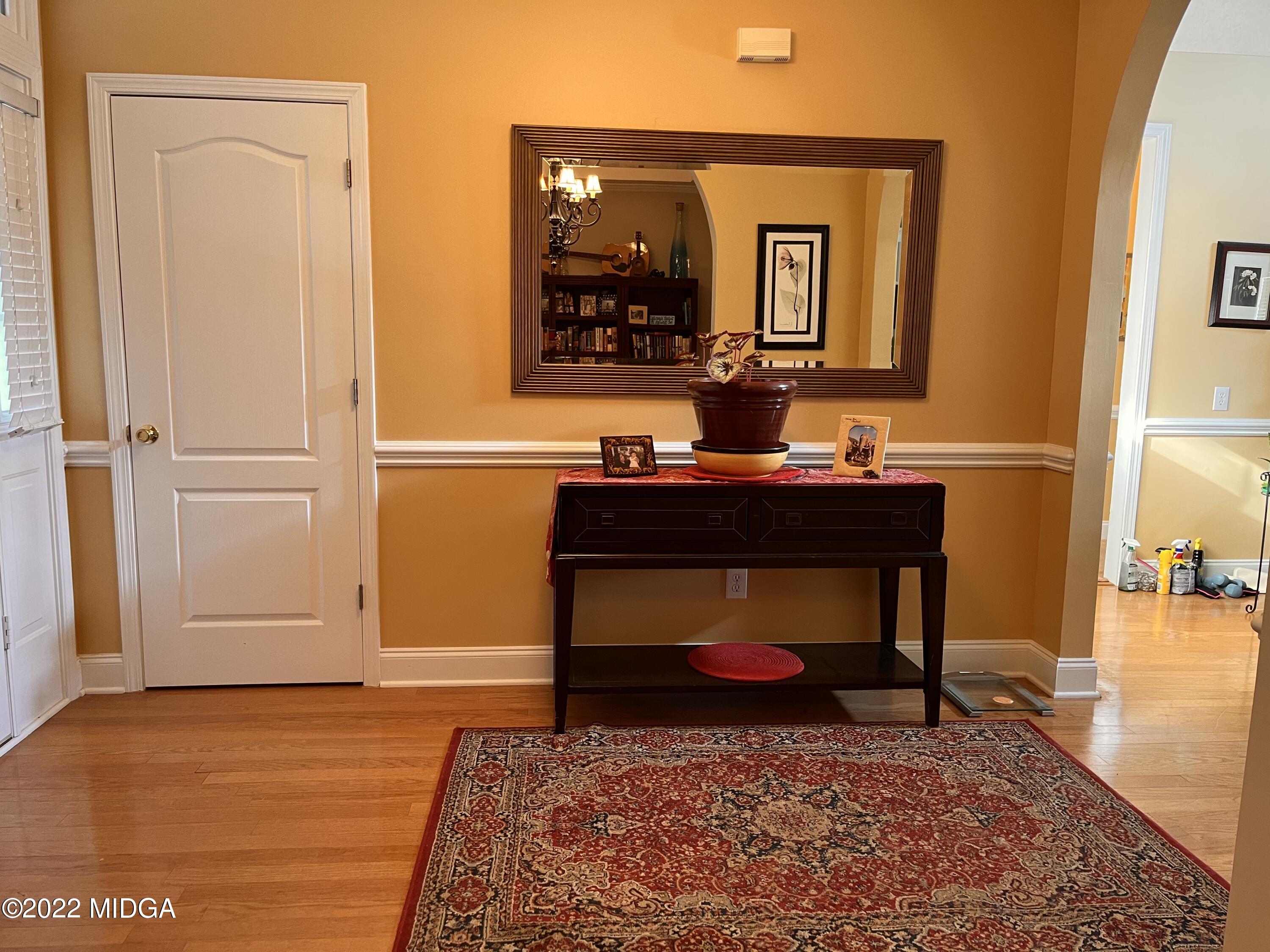 1277 Johnson Road Macon, GA 31220 - Photo 5 of 22 a room with mirror window and furniture