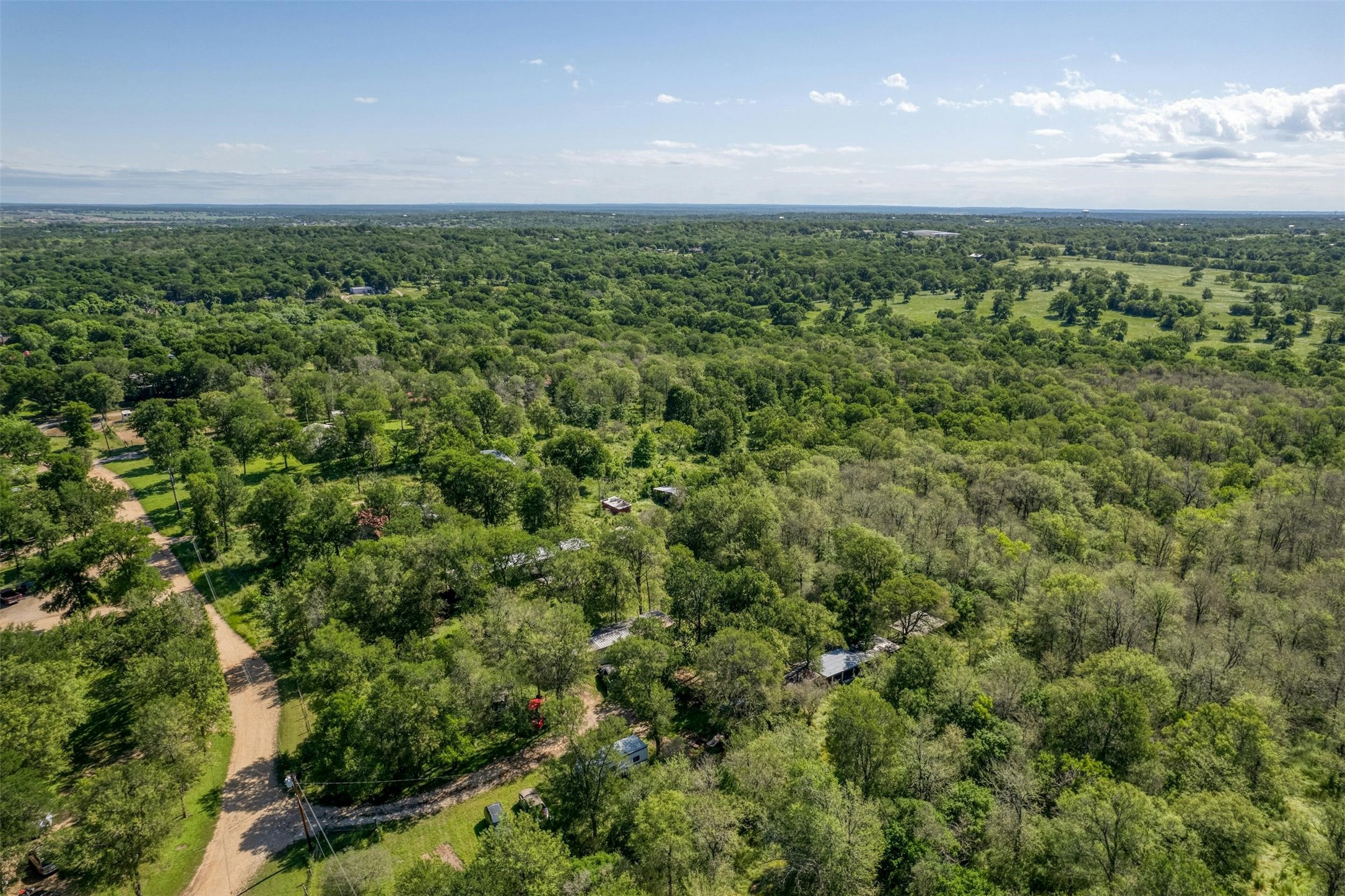 201 Fawn Ridge Road Cedar Creek, TX 78612 - Photo 9 of 21 a view of a green field