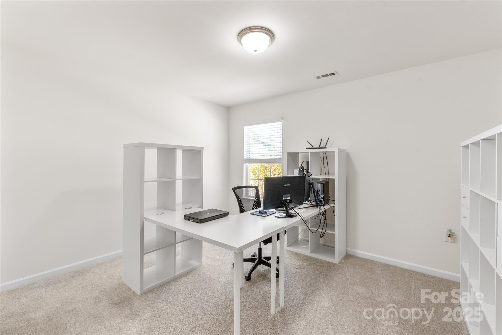 11818 Paver Lane Midland, NC 28107 - Photo 12 of 22 a view of a workspace with furniture