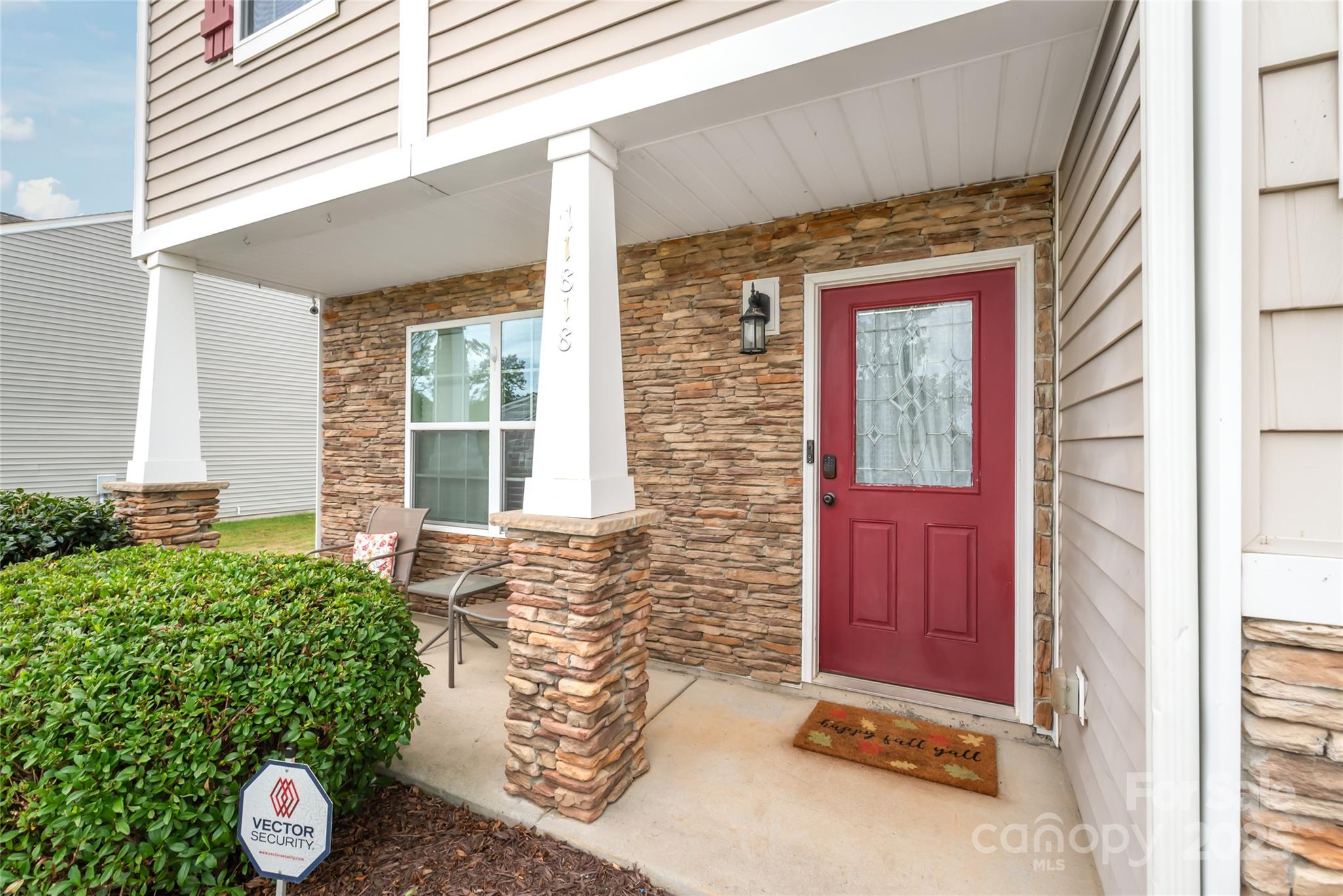 11818 Paver Lane Midland, NC 28107 - Photo 2 of 22 a front view of a house with a garden