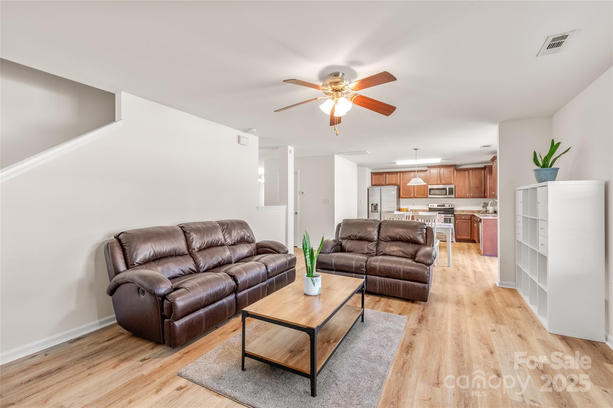 11818 Paver Lane Midland, NC 28107 - Photo 9 of 22 a living room with furniture and a wooden floor