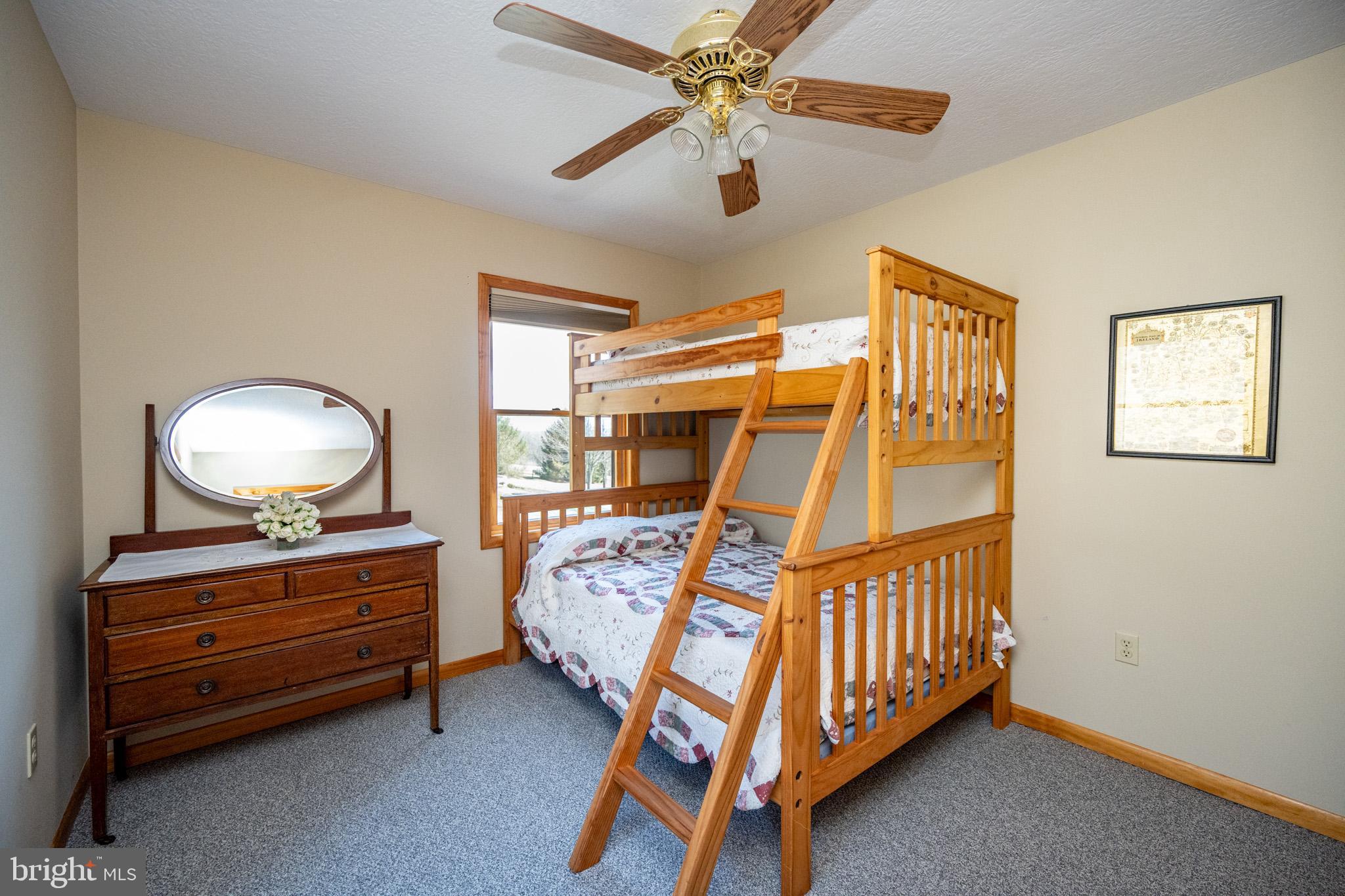 167 Sears Lane Swanton, MD 21561 - Photo 28 of 48 a bedroom with furniture and a window