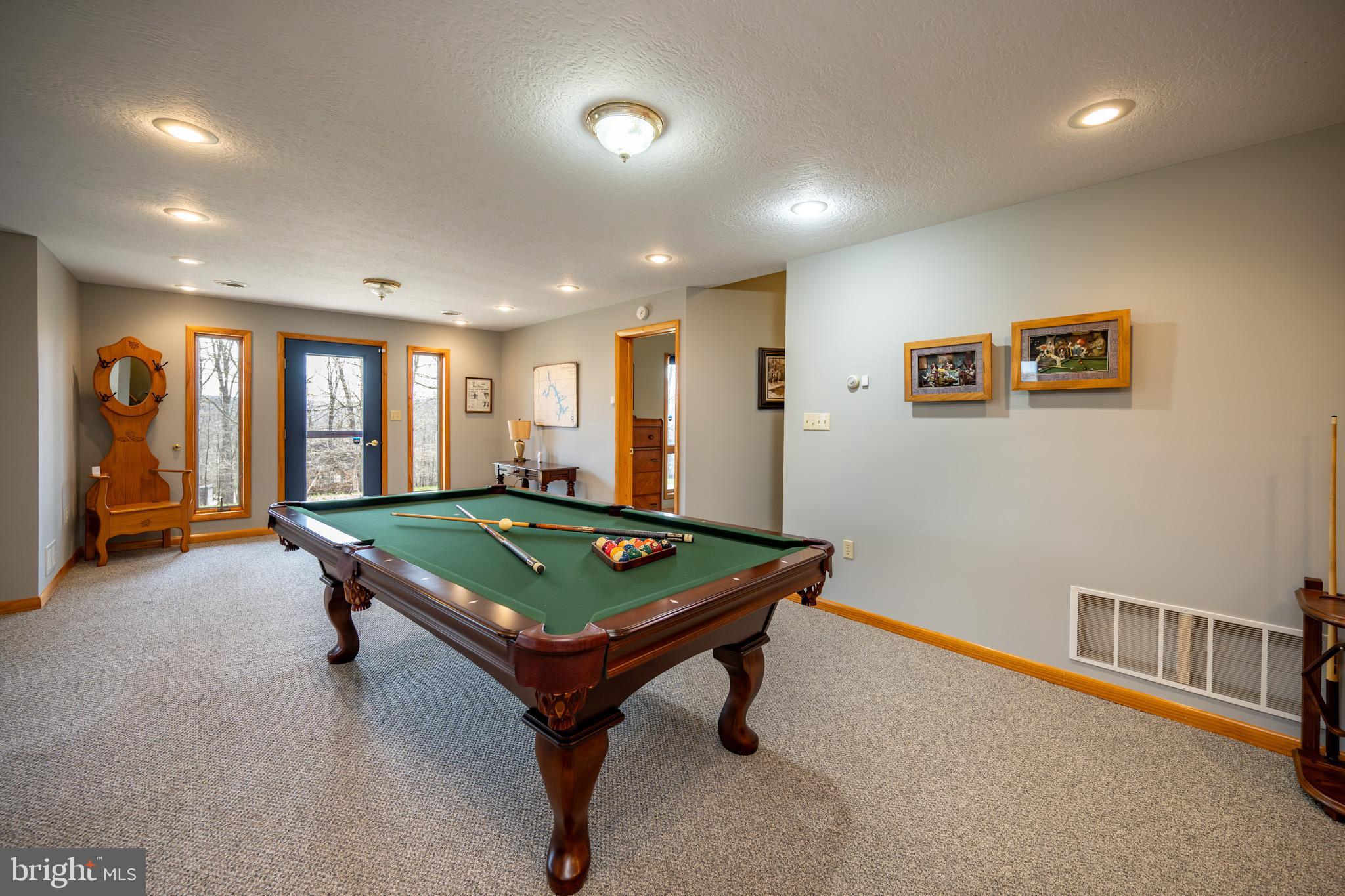 167 Sears Lane Swanton, MD 21561 - Photo 33 of 48 a room with pool table and windows