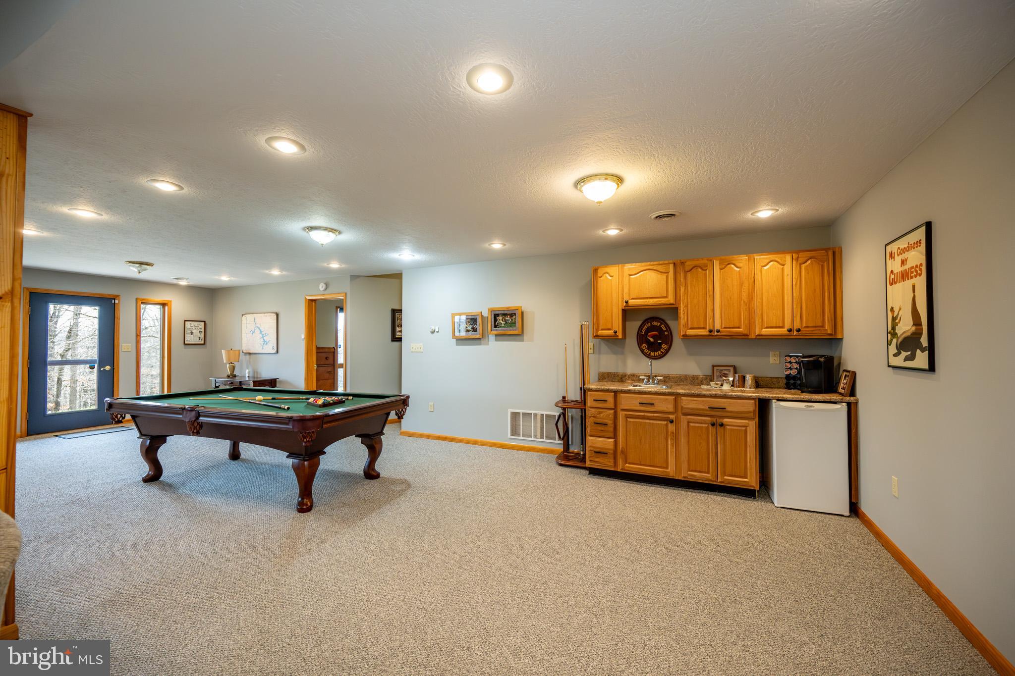 167 Sears Lane Swanton, MD 21561 - Photo 34 of 48 a living room with furniture and a wooden floor