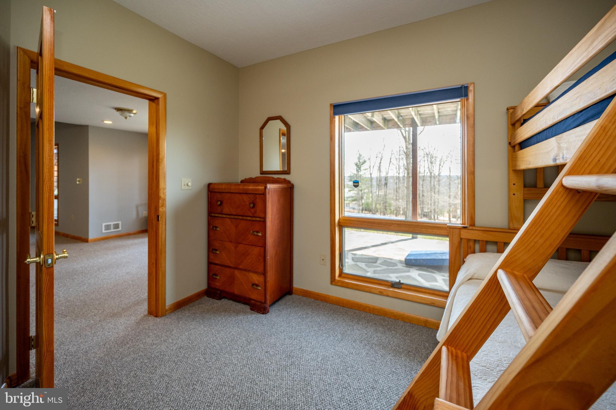 167 Sears Lane Swanton, MD 21561 - Photo 43 of 48 a view of room with furniture and windows