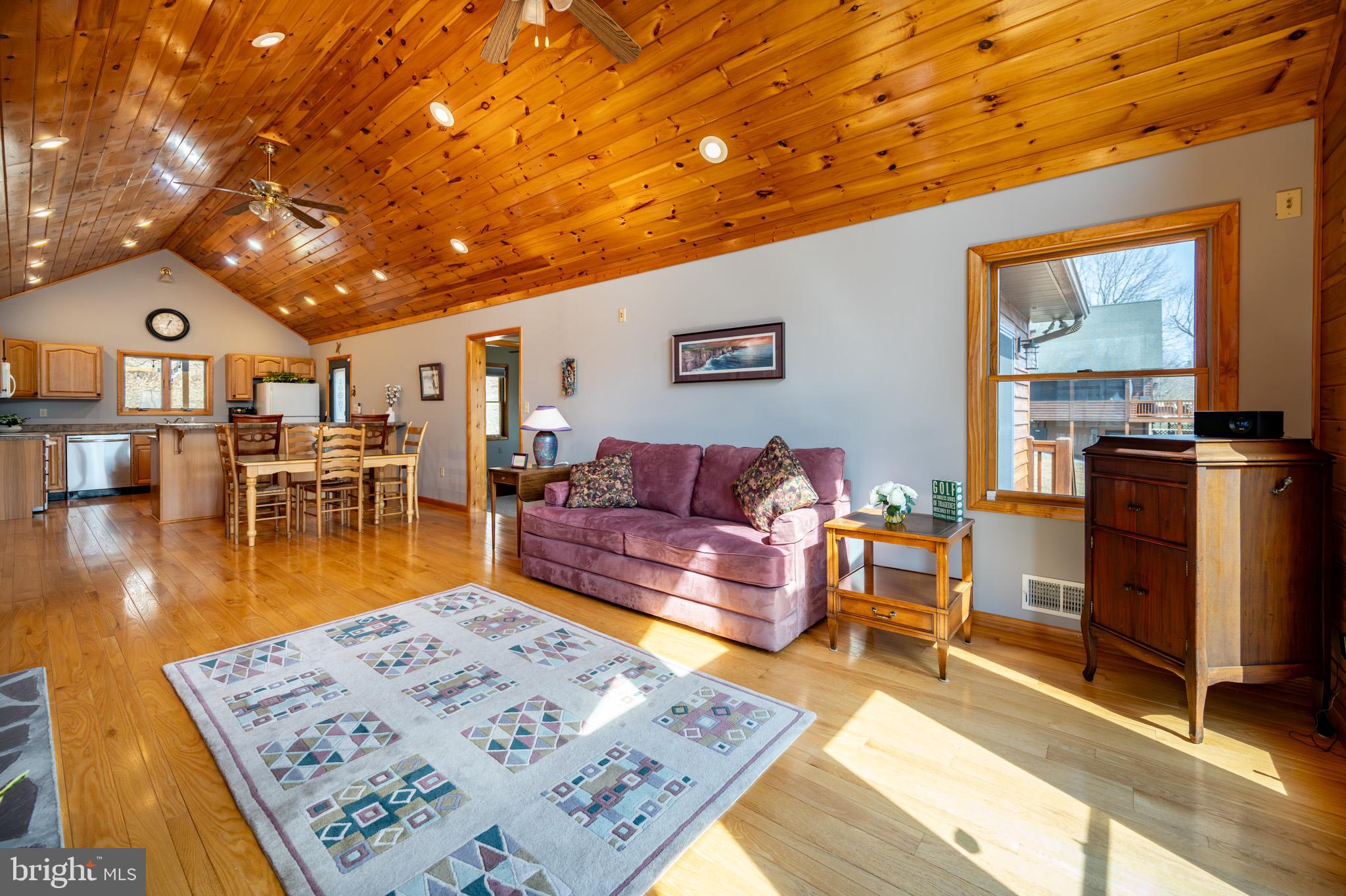 167 Sears Lane Swanton, MD 21561 - Photo 8 of 48 a living room with furniture and a table