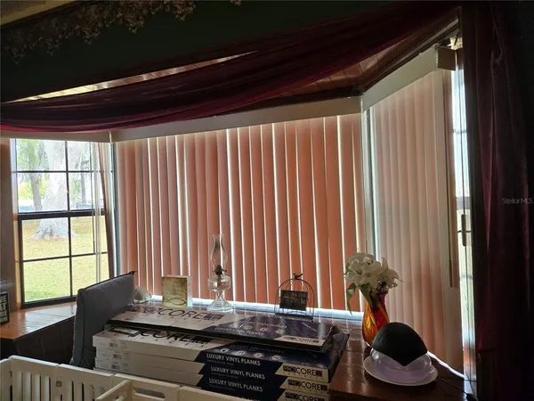 a room with furniture and two chair