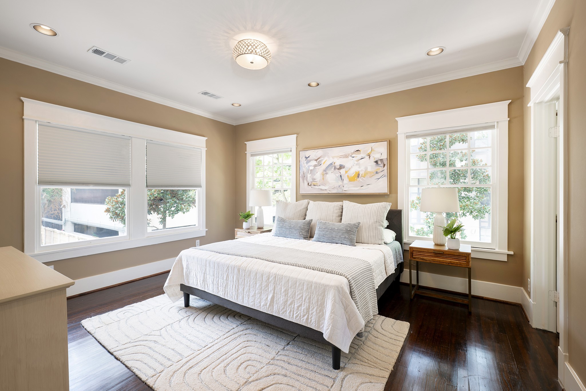 1640 Sul Ross Street Houston, TX 77006 - Photo 12 of 35 a bedroom with a large bed and a large window