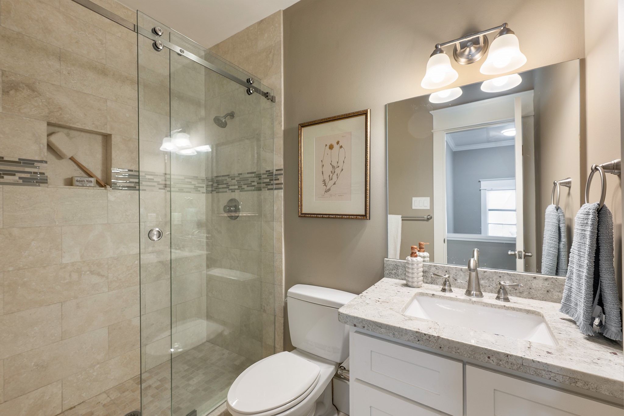 1640 Sul Ross Street Houston, TX 77006 - Photo 17 of 35 a bathroom with a sink toilet vanity and shower