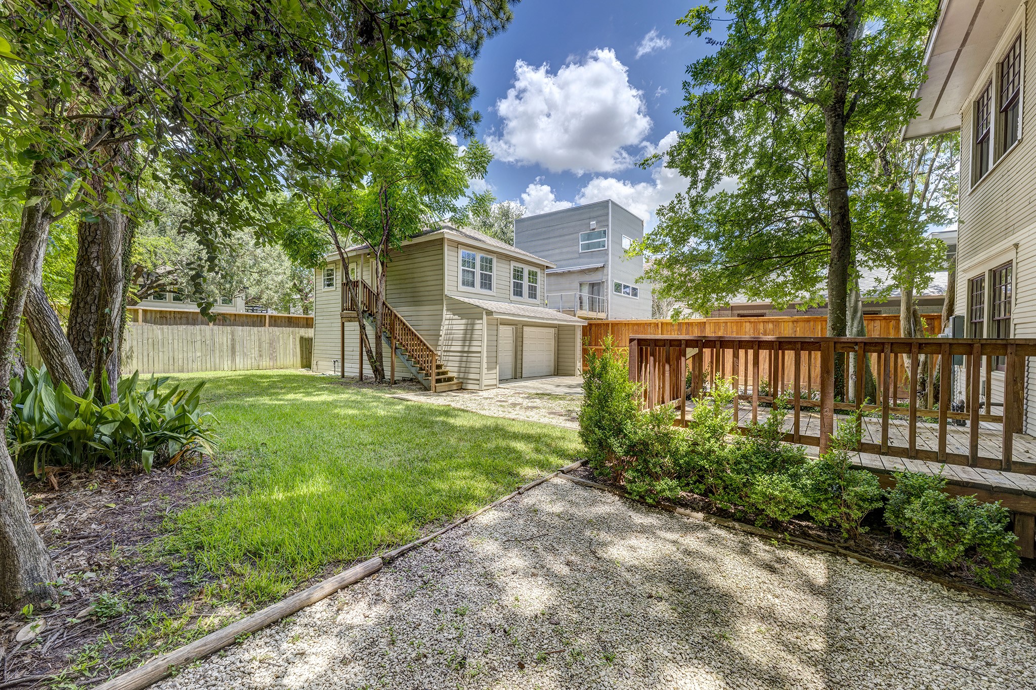 1640 Sul Ross Street Houston, TX 77006 - Photo 18 of 35 a front view of a house with a yard and a garden