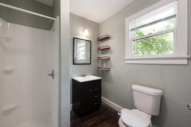 a view of an empty room and window