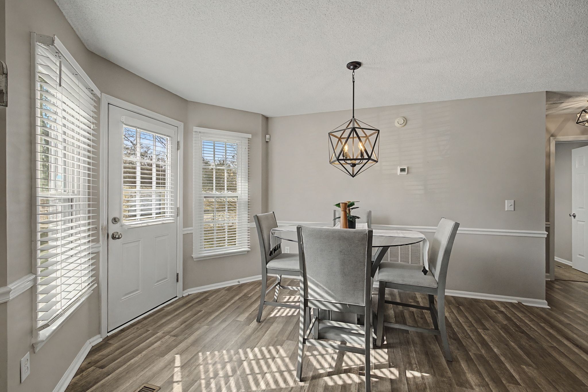 723 Hogan Drive Murfreesboro, TN 37128 - Photo 12 of 31 a view of a dining room with furniture window and wooden floor