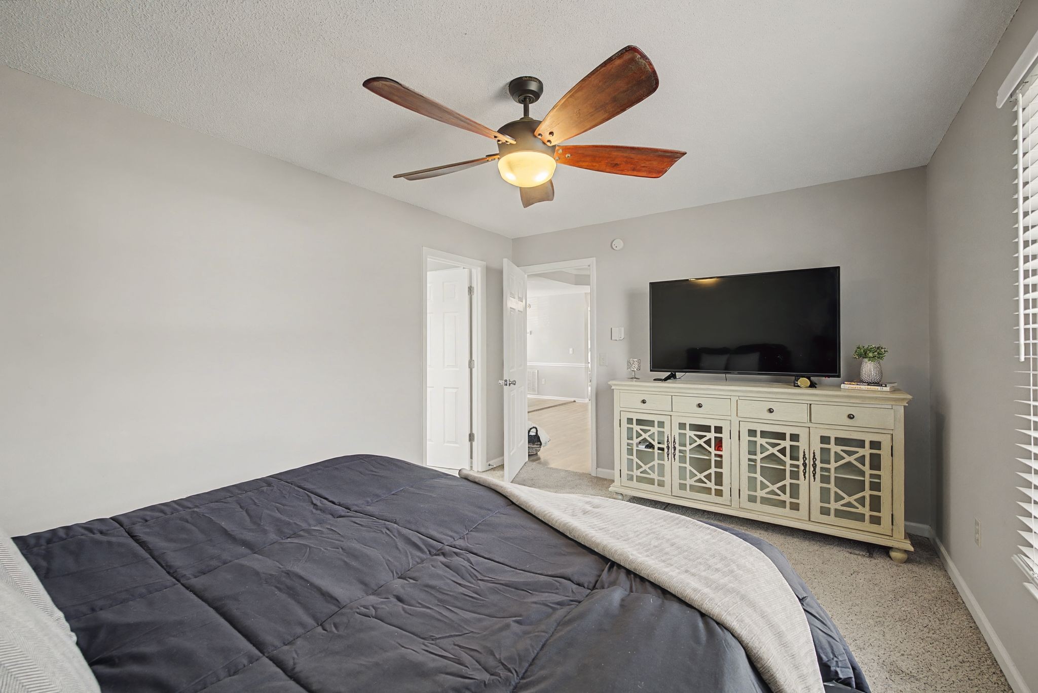 723 Hogan Drive Murfreesboro, TN 37128 - Photo 20 of 31 a bedroom with a bed and a flat screen tv