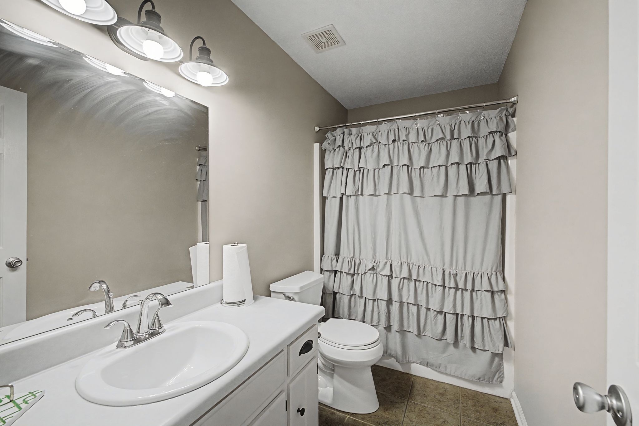 723 Hogan Drive Murfreesboro, TN 37128 - Photo 23 of 31 a bathroom with a toilet sink and mirror