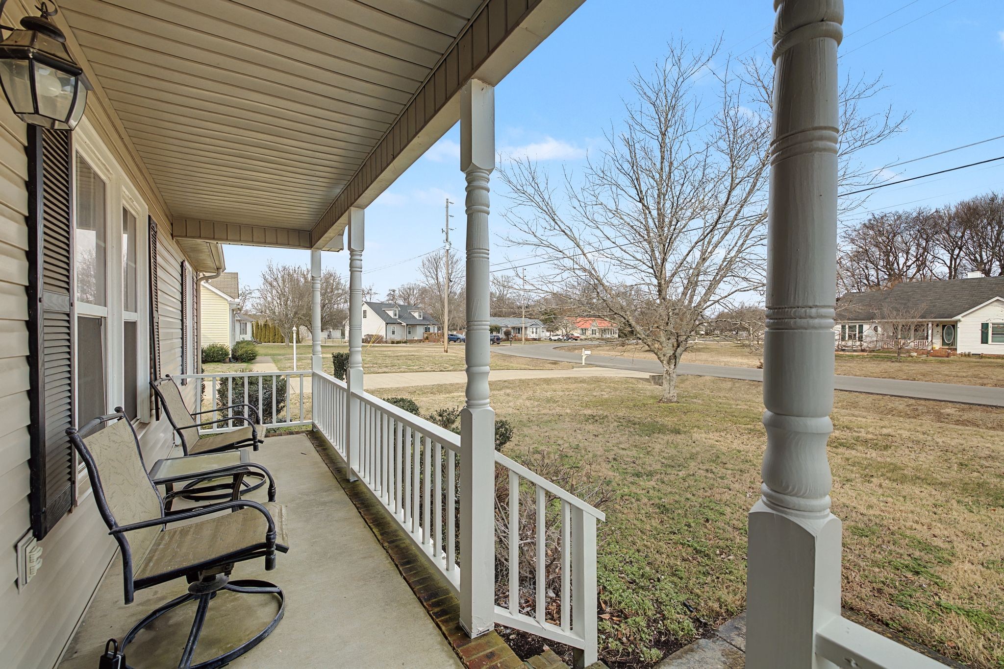 723 Hogan Drive Murfreesboro, TN 37128 - Photo 5 of 31 a view of a porch with wooden floor next to a yard