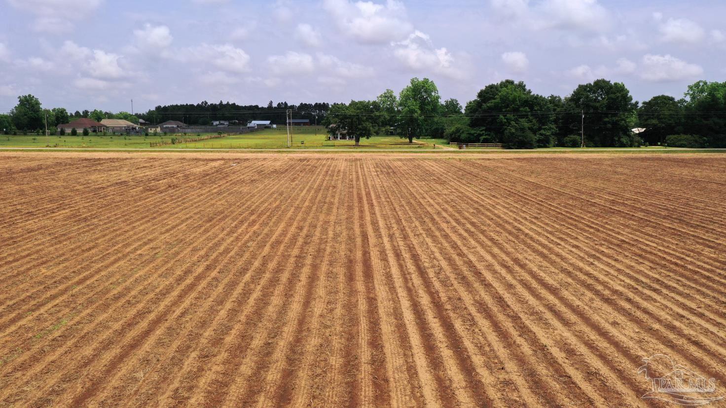 1 Salter Road Milton, FL 32571 - Photo 9 of 19 a view of an outdoor space and tennis court