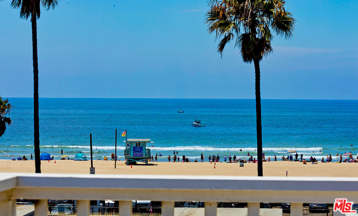 a view of a street with an ocean view