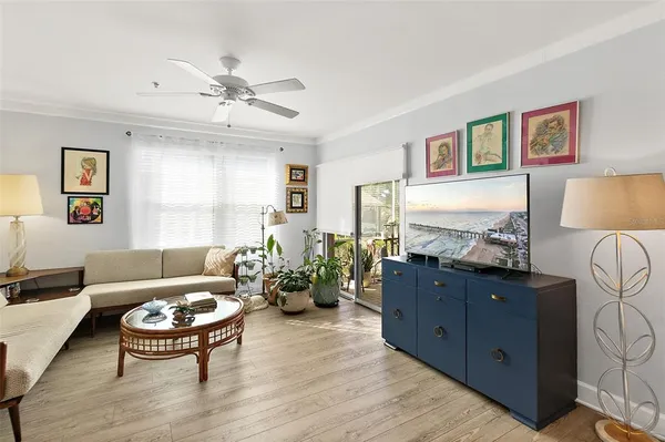 a living room with furniture and a table