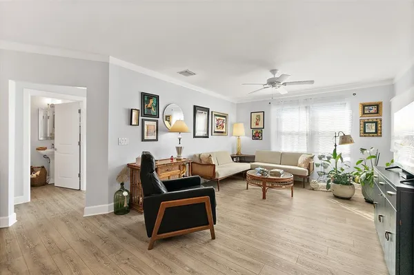 a view of a living room and dining room