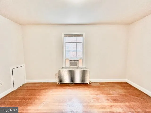 a view of an empty room and window