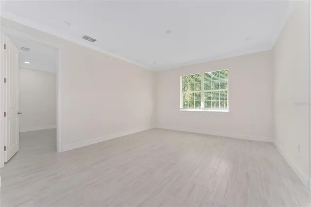 an empty room with windows