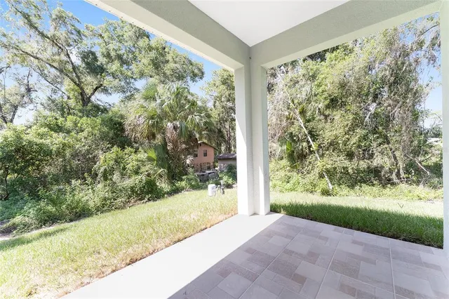 a view of a porch with a yard
