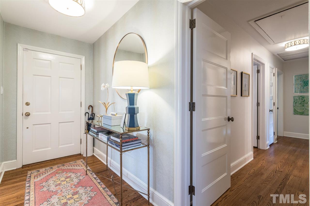 3425 Leonard Street Raleigh, NC 27607 - Photo 3 of 28 a view of a room with wooden floor and furniture