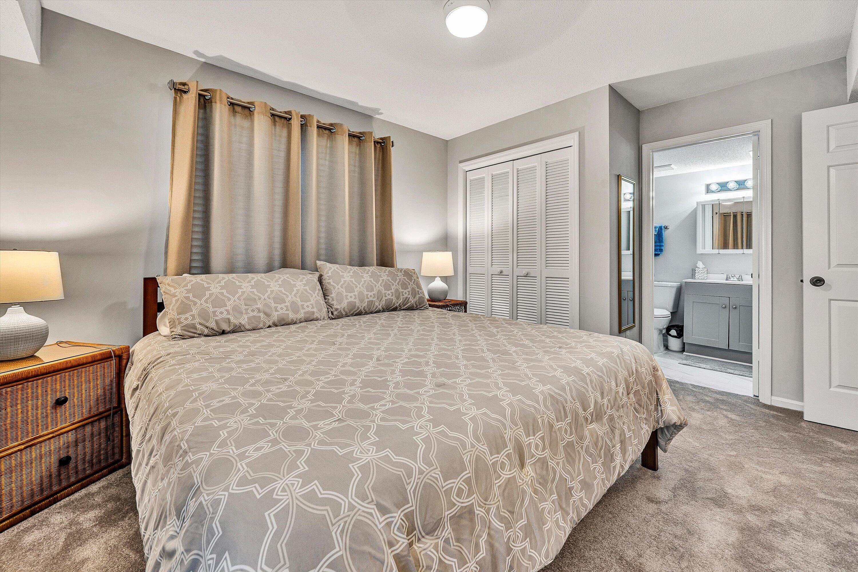 620 Monte Vista Road, Unit 605 Union Hall, VA 24176 - Photo 27 of 41 a bedroom with a bed and a lamp
