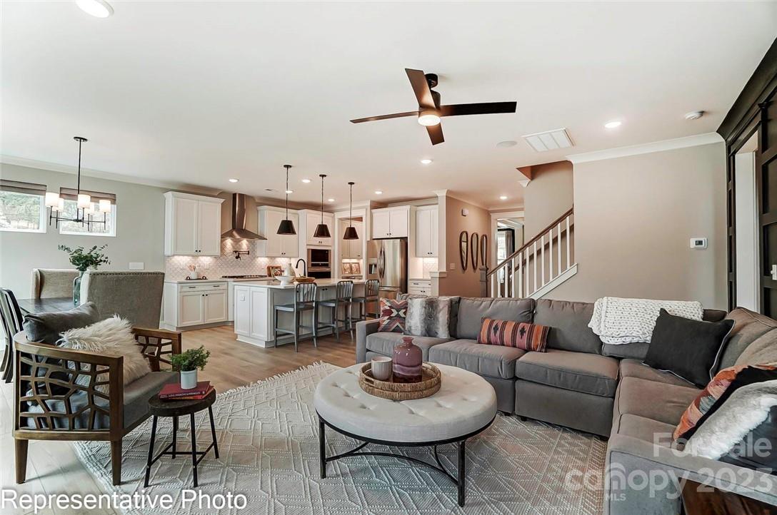 109 Old Fld Road Statesville, NC 28677 - Photo 11 of 37 a living room with furniture and kitchen view