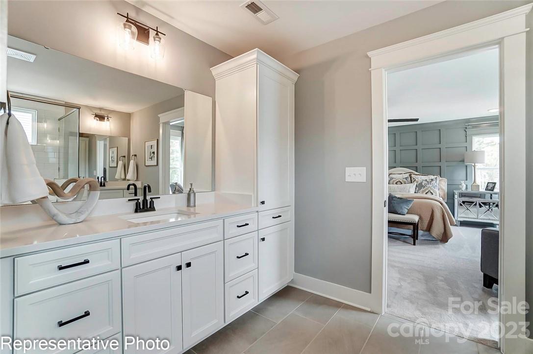 109 Old Fld Road Statesville, NC 28677 - Photo 15 of 37 a en suite spacious bathroom with a double vanity sink and shower