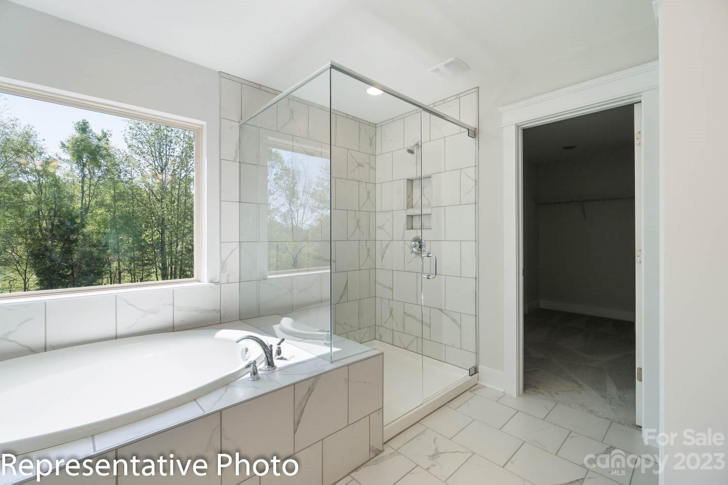 109 Old Fld Road Statesville, NC 28677 - Photo 28 of 37 a bathroom with a granite countertop tub shower and sink