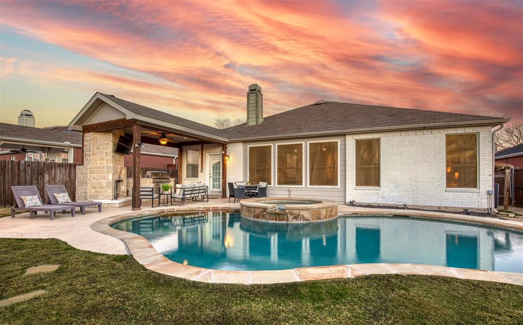 2805 Whetstone Drive Corinth, TX 76210 - Photo 2 of 38 a front view of a house with swimming pool