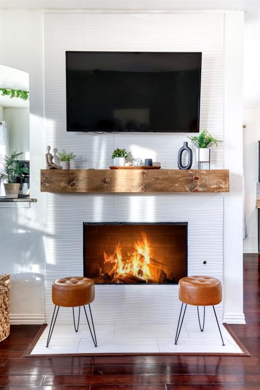 2805 Whetstone Drive Corinth, TX 76210 - Photo 10 of 38 a room with furniture and flat screen tv