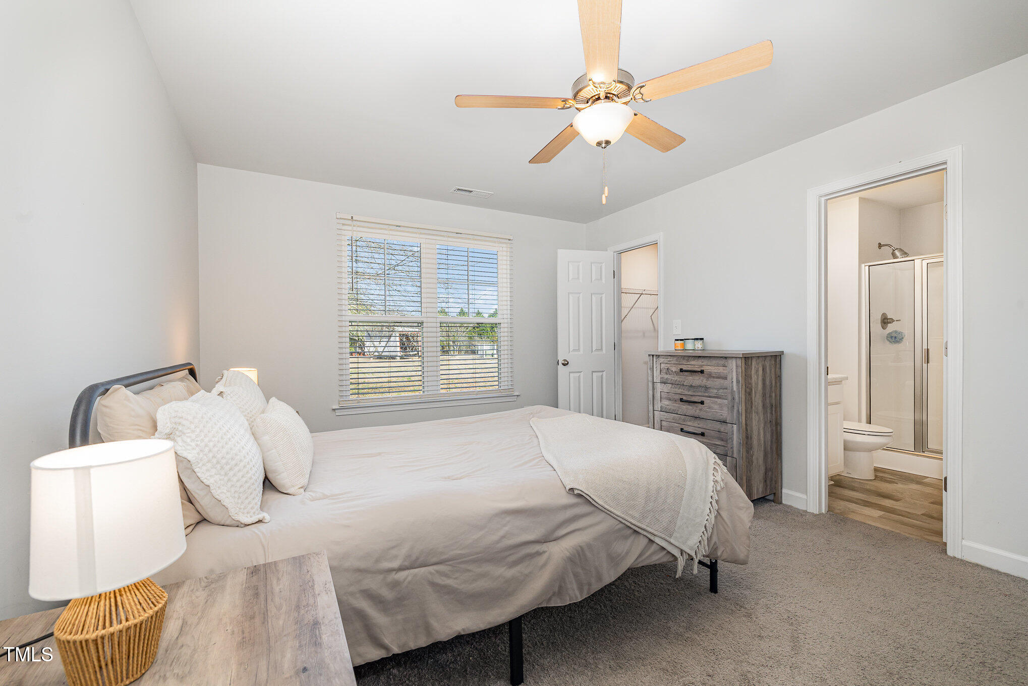 521 Green Path Road Godwin, NC 28344 - Photo 8 of 20 a bedroom with a bed and a window