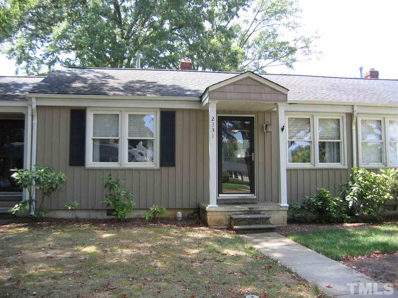 2331 Bernard Street, Unit 2331 Raleigh, NC 27608 - Photo 1 of 12 a front view of a house with garden