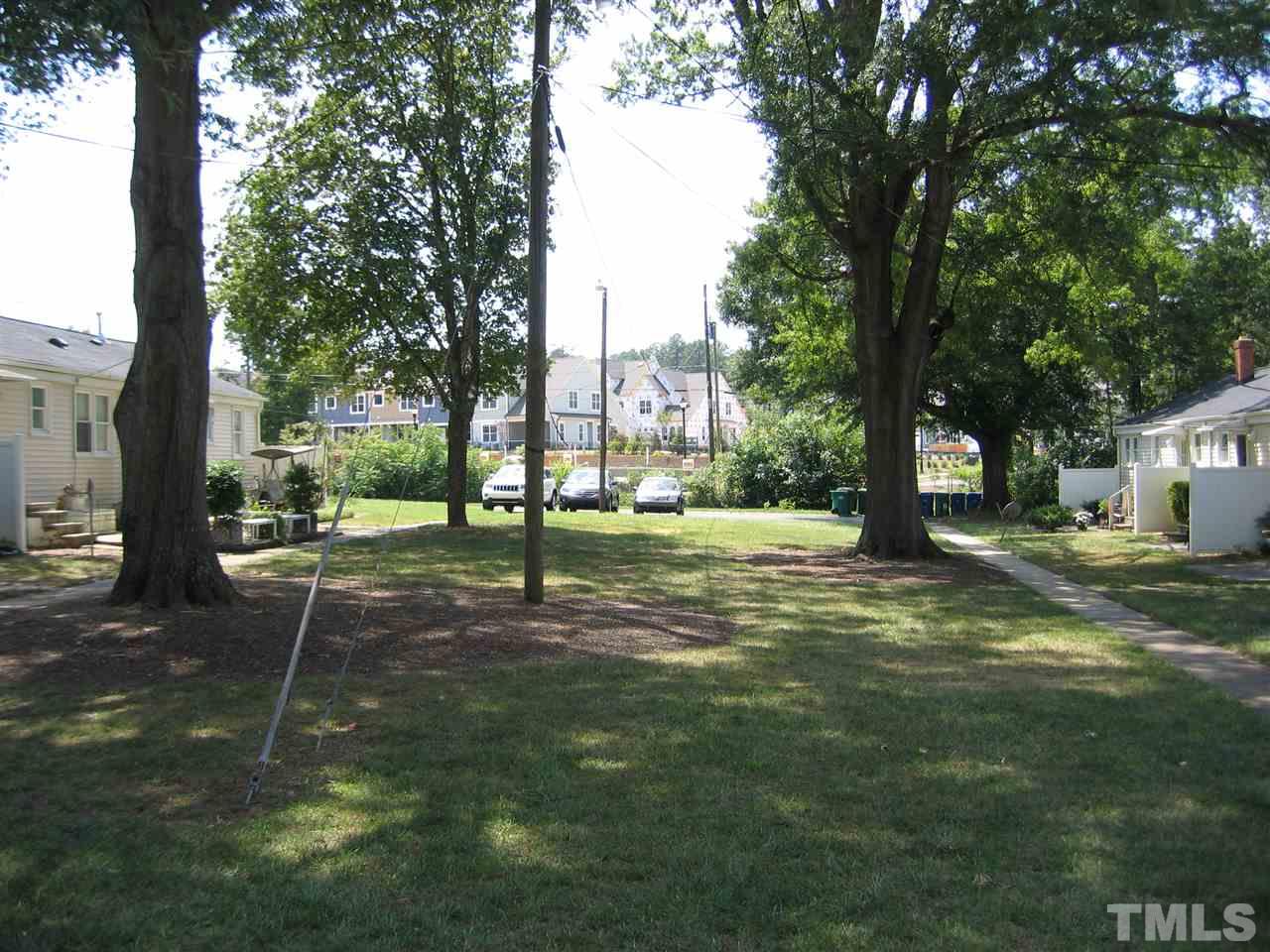 2331 Bernard Street, Unit 2331 Raleigh, NC 27608 - Photo 11 of 12 a view of a tree in a yard