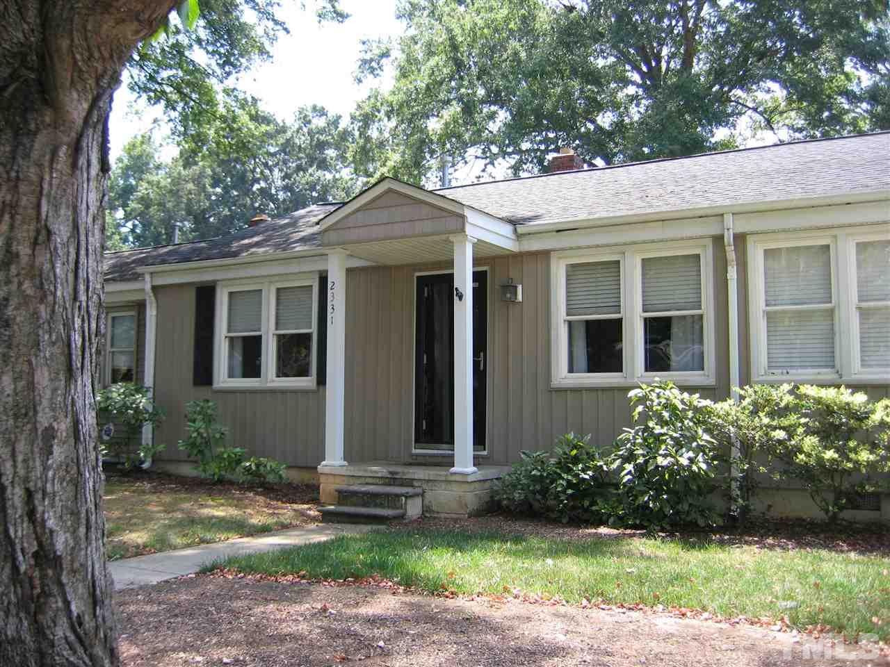 2331 Bernard Street, Unit 2331 Raleigh, NC 27608 - Photo 12 of 12 a view of a house with a yard
