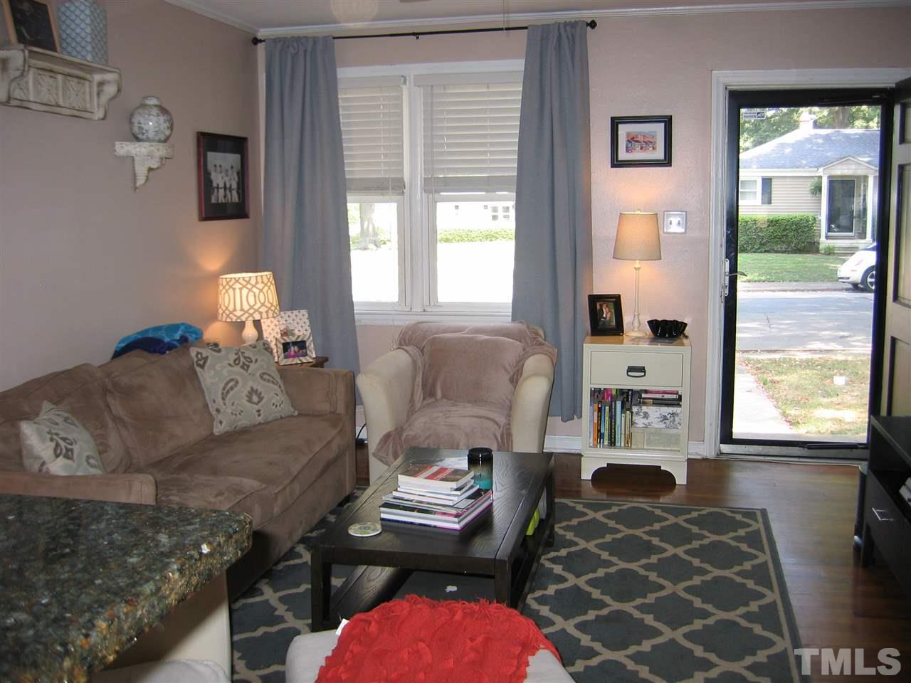2331 Bernard Street, Unit 2331 Raleigh, NC 27608 - Photo 4 of 12 a living room with furniture and a large window