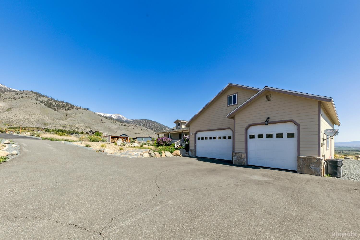 705 Sunrise Trail Markleeville, CA 96120 - Photo 31 of 39 a view of a house with a mountain in the background