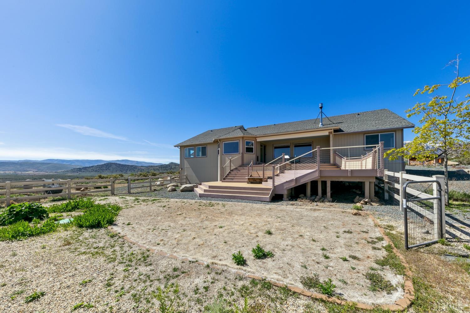 705 Sunrise Trail Markleeville, CA 96120 - Photo 32 of 39 a view of a house with furniture and a table