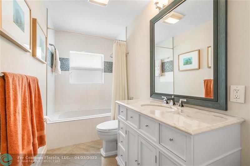 2932 Northeast 36th Street Lighthouse Point, FL 33064 - Photo 19 of 31 a bathroom with a sink toilet and shower