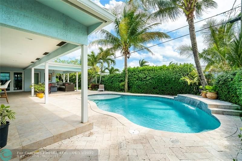 2932 Northeast 36th Street Lighthouse Point, FL 33064 - Photo 24 of 31 a view of a house with swimming pool