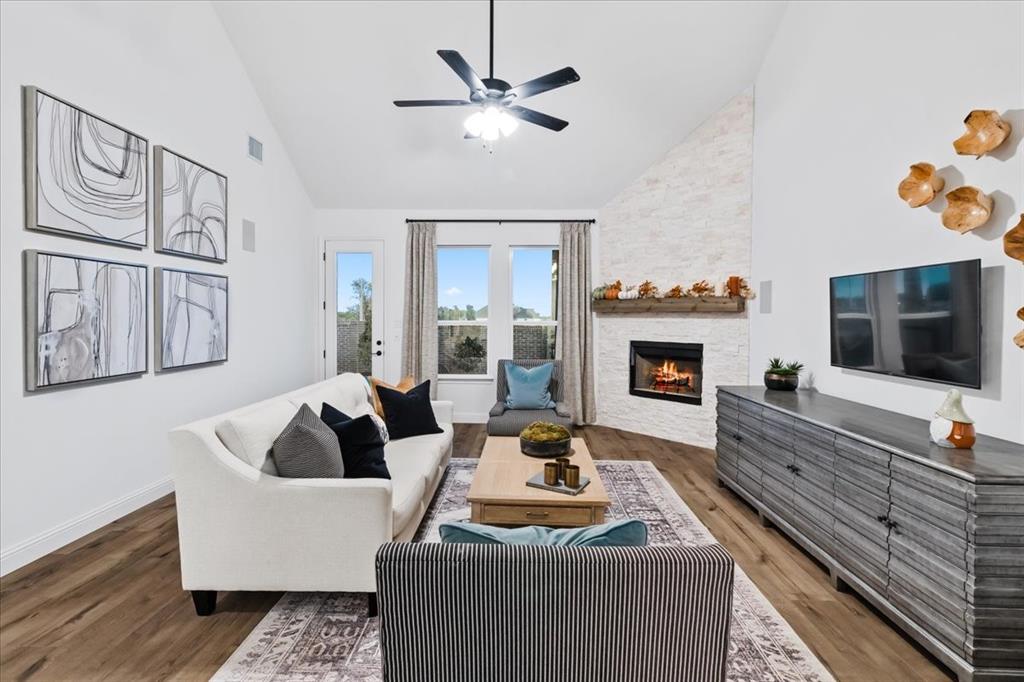 1210 Terrain Road Midlothian, TX 76065 - Photo 11 of 39 a living room with furniture fireplace and flat screen tv