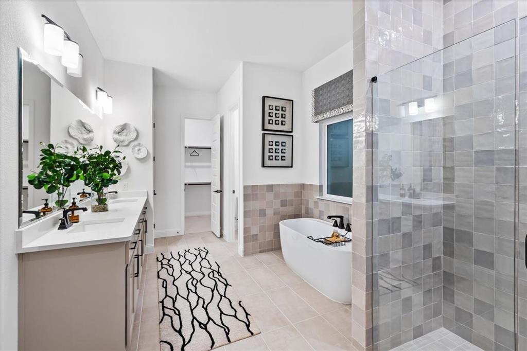 1210 Terrain Road Midlothian, TX 76065 - Photo 15 of 39 a bathroom with a sink and mirror with shower